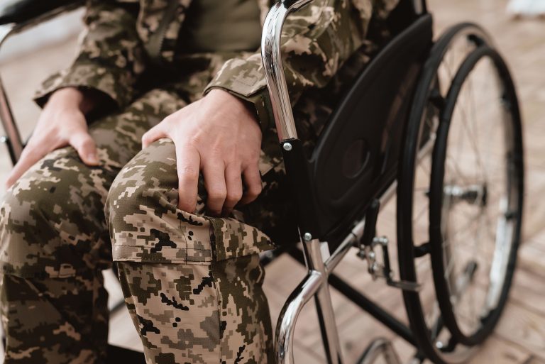 Army, Navy, Air Force Injury and Accident Compensation - Veteran in wheelchair Personal Injury Claims Brighton